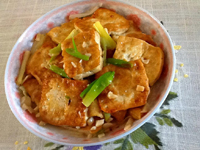 煎豆腐怎么不粘锅 动锅不动铲还要火候